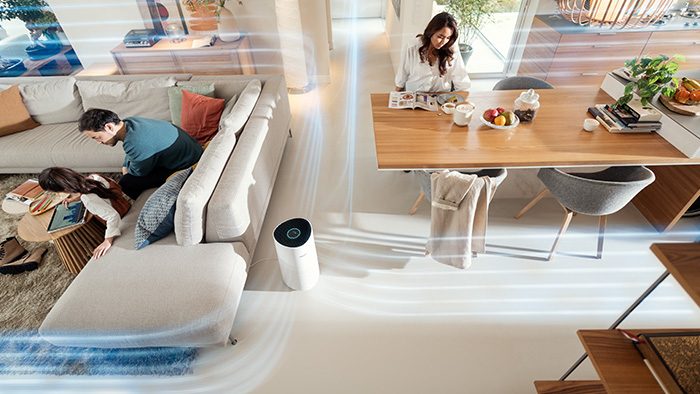 Optimala prestanda, familj som sitter i vardagsrummet